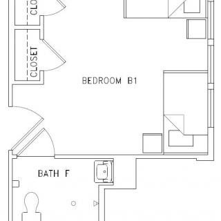 Blueprint showing the layout of a bedroom and bathroom.