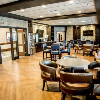 A modern restaurant dining area with stylish decor and comfortable seating.
