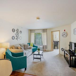 A cozy living room with stylish furnishings and decor.