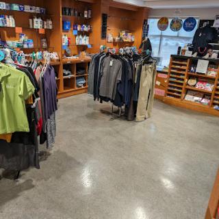 A view of a retail clothing store showcasing various apparel and merchandise.