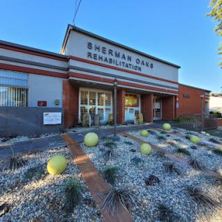 Sherman Oaks Rehabilitation Center, featuring modern architecture and vibrant landscaping.