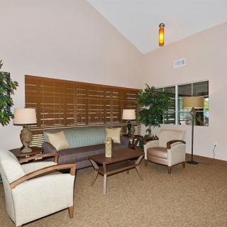 A cozy living room with comfortable seating and stylish decor.