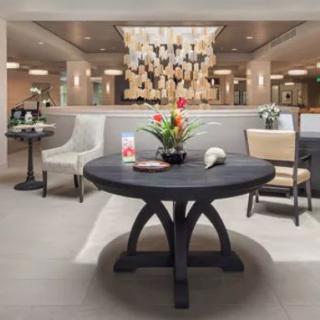 A stylish lobby area featuring elegant furniture and modern decor.