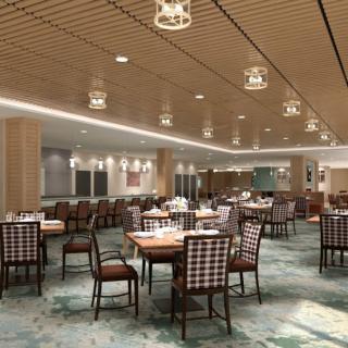 A modern restaurant dining area with neatly arranged tables and contemporary lighting.