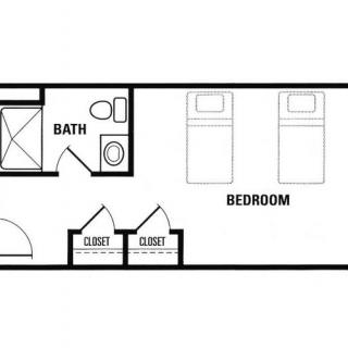 A simple floor plan featuring a bedroom with two beds, a bathroom, and closets.