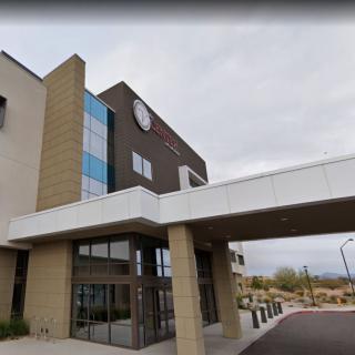 Exterior view of a hospital building entrance.