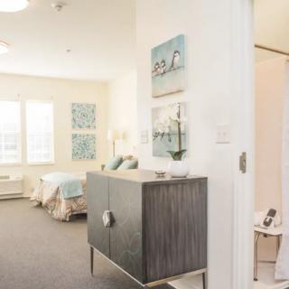 A modern bedroom interior with stylish decor and furniture.