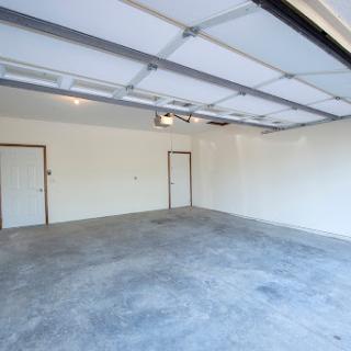 A spacious and clean empty garage ready for storage or parking.