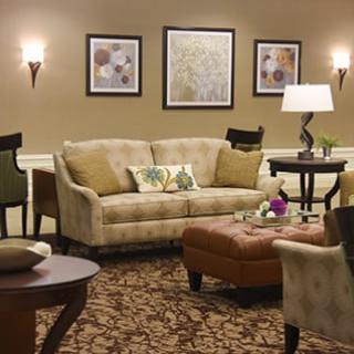 A cozy living room with elegant furniture and tasteful decor.