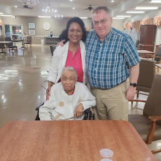 A heartwarming moment shared with loved ones in a community center.