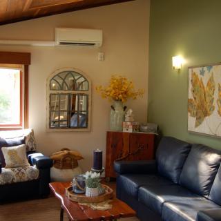Cozy living room with tasteful decor and comfortable seating.
