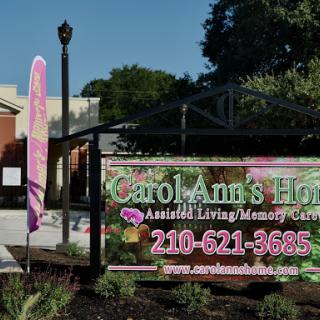 A sign for Carol Ann's Home, an assisted living and memory care facility.