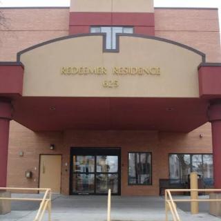 Entrance of a public building with an awning.