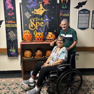 Celebrating Halloween with festive decorations and smiles.