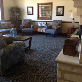 A cozy living room featuring comfortable seating and tasteful decor.