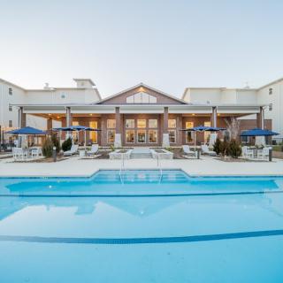 A luxurious resort with inviting swimming pools and a relaxing atmosphere.