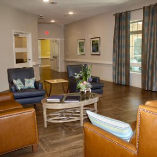 A cozy and inviting lounge area featuring comfortable seating and modern decor.