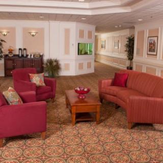 A cozy lounge area featuring comfortable seating and a welcoming atmosphere.