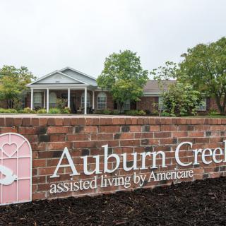Entrance sign for Auburn Creek assisted living facility.
