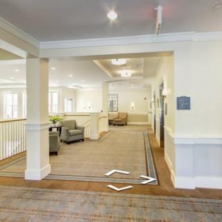 A spacious, well-lit lobby area with comfortable seating and elegant design.