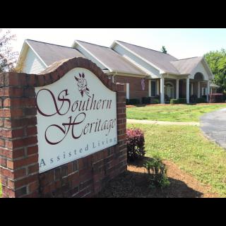 Entrance sign for Southern Heritage, showcasing a well-maintained building and landscaped grounds.