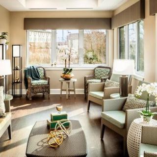 A bright and modern living room with ample seating and natural light.