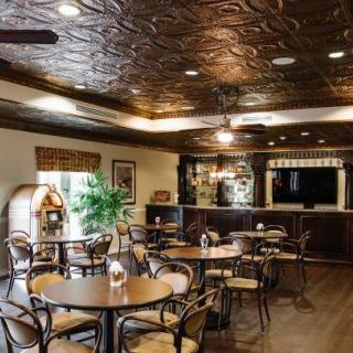 Cozy cafe interior with stylish decor and comfortable seating.