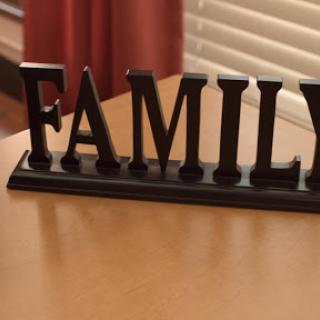 A decorative piece symbolizing the importance of family.