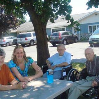 A group of individuals enjoying a sunny day together outdoors.