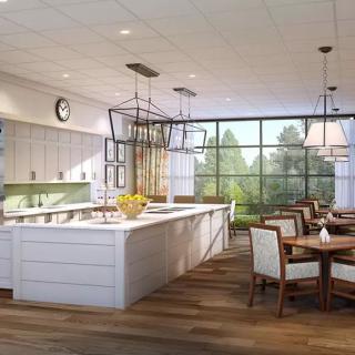 A spacious modern kitchen and dining area with an island countertop and abundant natural light.