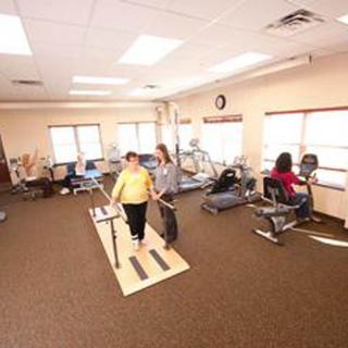 A physical therapy session taking place in a rehabilitation center.
