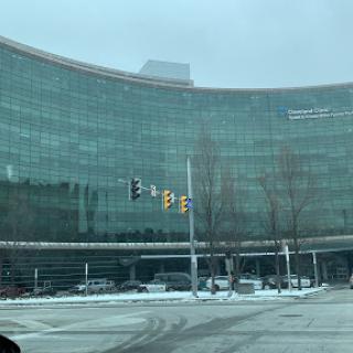 A modern glass building captured on a chilly winter day.
