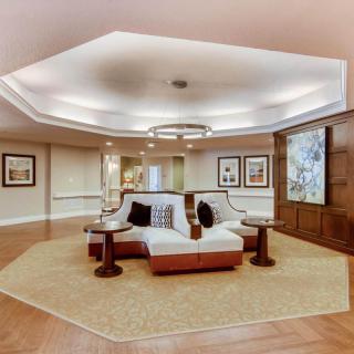 A modern lobby with elegant seating and artistic decorations.
