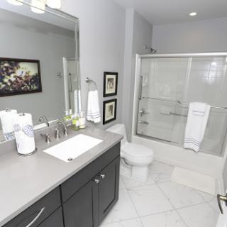 A contemporary bathroom featuring sleek design elements and a clean aesthetic.