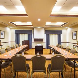 A well-arranged meeting room equipped for professional gatherings.