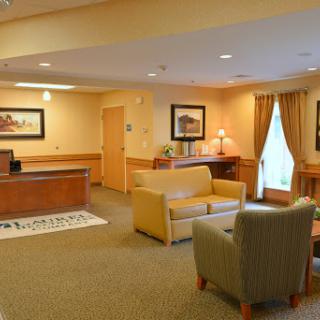 A welcoming lobby featuring comfortable seating and a reception desk.