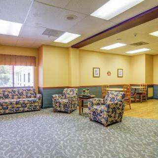 A cozy lounge area featuring comfortable seating and a welcoming atmosphere.