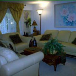 A cozy living room with comfortable sofas and elegant decor.