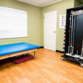 A well-equipped therapy room designed for physical rehabilitation.