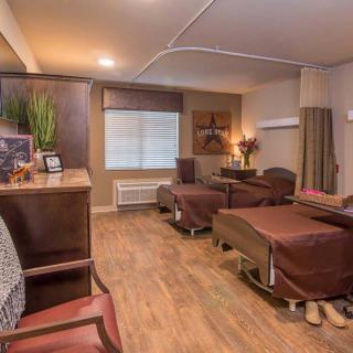 A tranquil spa room with massage beds for relaxation therapy.
