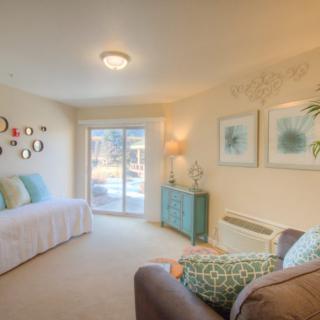 A cozy living room with modern decor and bright natural light.