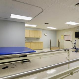 A clean and modern rehabilitation room in a hospital.