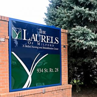 The sign for The Laurels of Milford, a residential care and rehabilitation center.