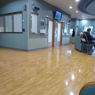 A view of a clean and spacious hospital waiting room.