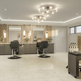 A modern and spacious hair salon interior with stylish chairs and large mirrors.