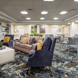 A modern living room with comfortable seating and stylish decor.