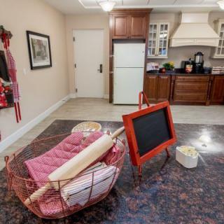 A cozy kitchen with baking essentials and vintage decor.