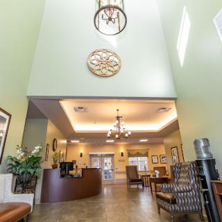 A spacious and inviting lobby with elegant lighting and comfortable seating.