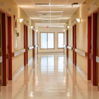 A clean and well-lit hospital hallway.