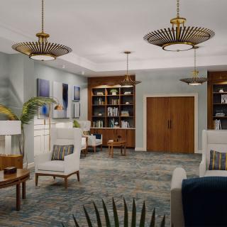 A modern and cozy living room with stylish lighting and comfortable furniture.